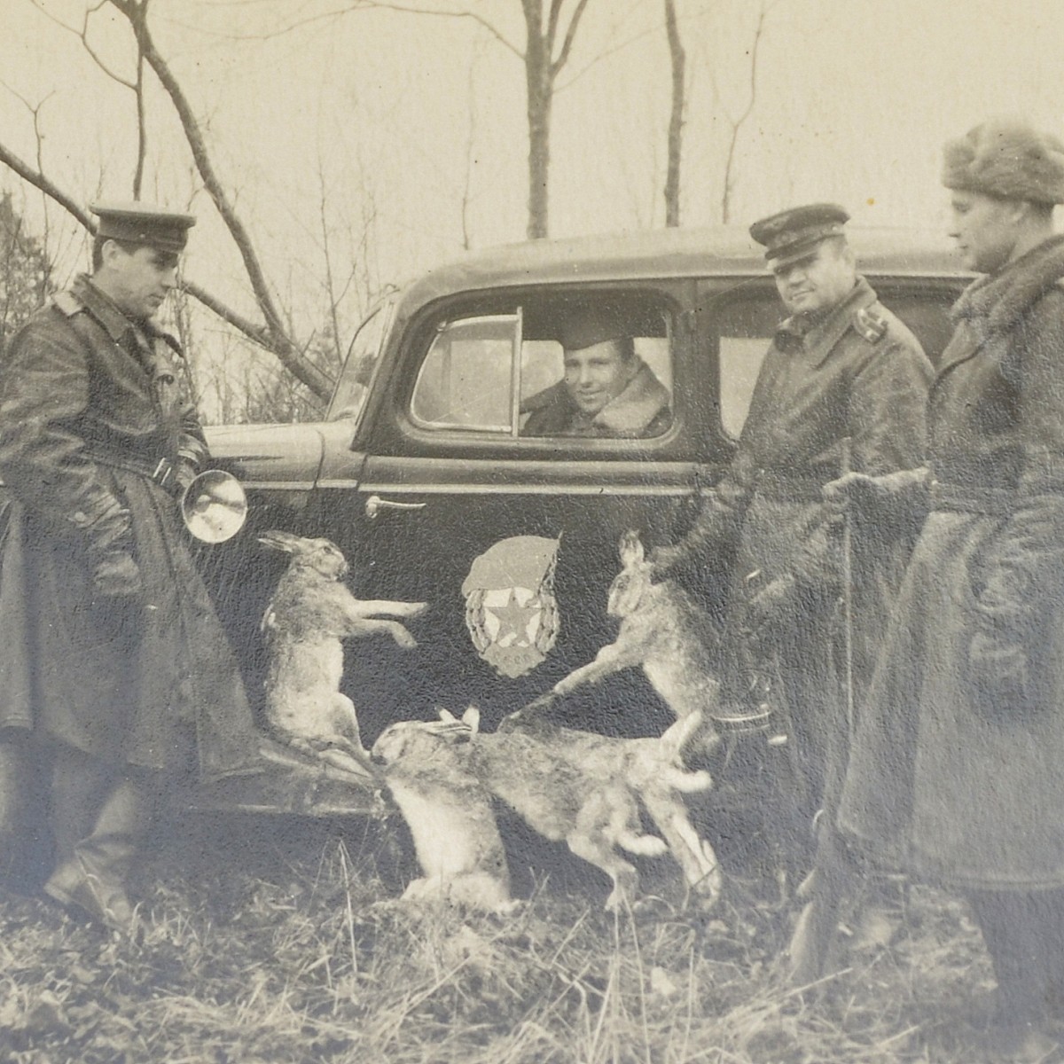 Photo of hunter–pilots of the 123rd Bomber Regiment, with trophies