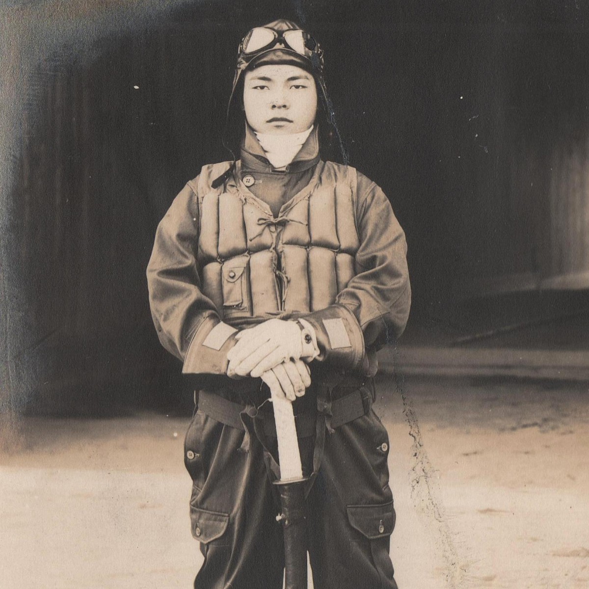 Photo of a Japanese pilot with a sword