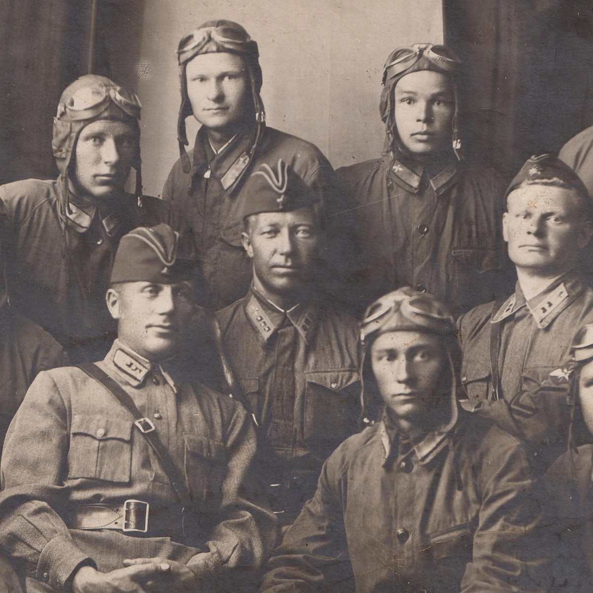 Colorful photo of soldiers and officers of the Red Army Air Force in flight helmets, 1940