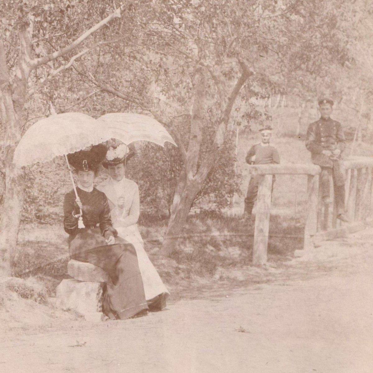 Photo of ladies surrounded by a soldier and an officer RIA