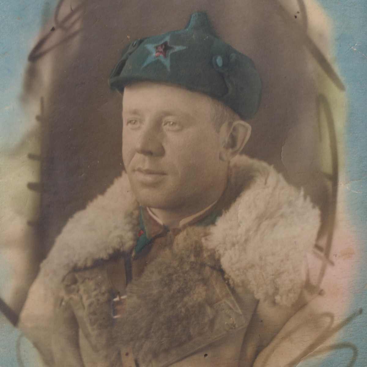 Color photo of the commander of the Red Army Air Force in winter bekesh and Budenovka