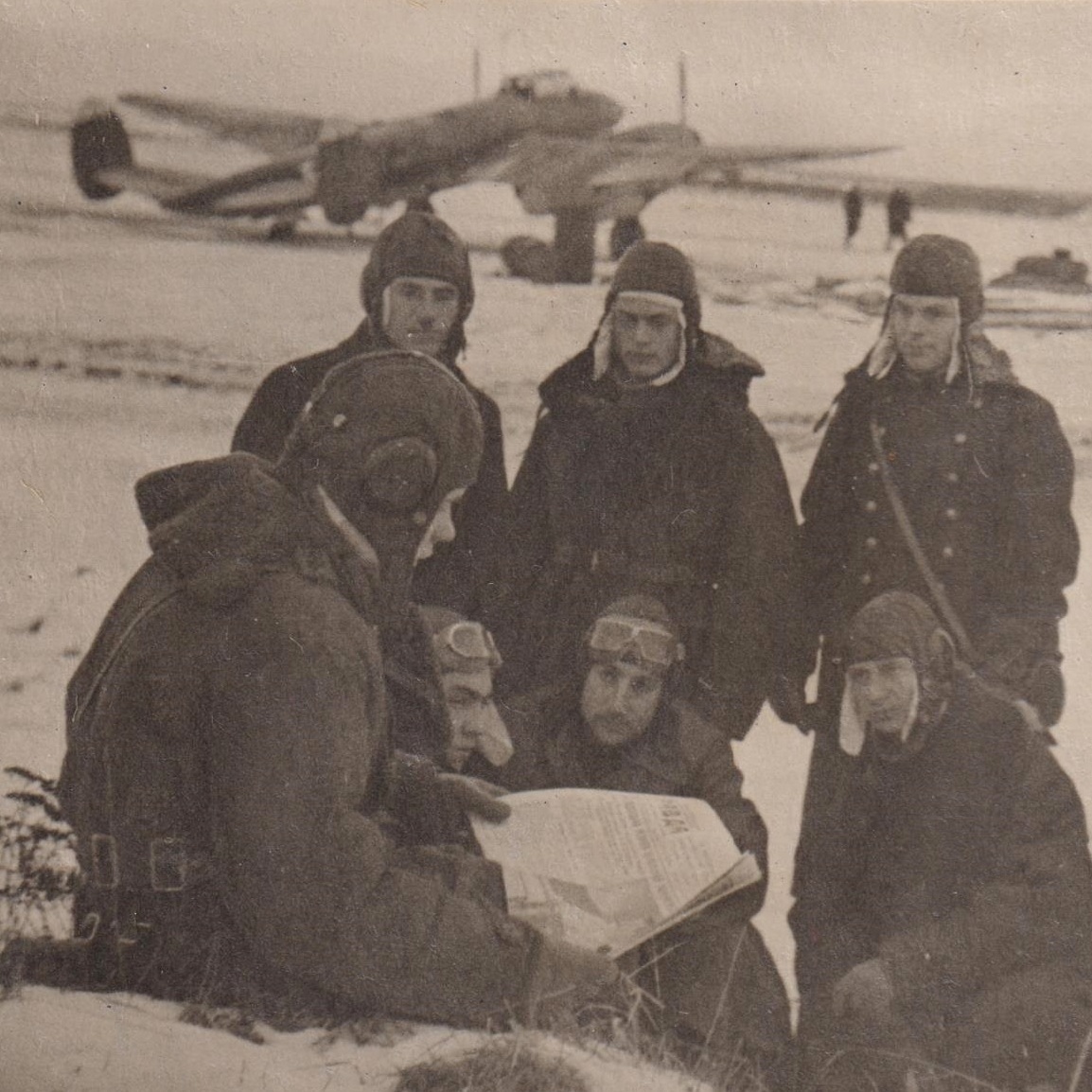 Photo of Red Army Air Force pilots in flight uniforms at the aircraft
