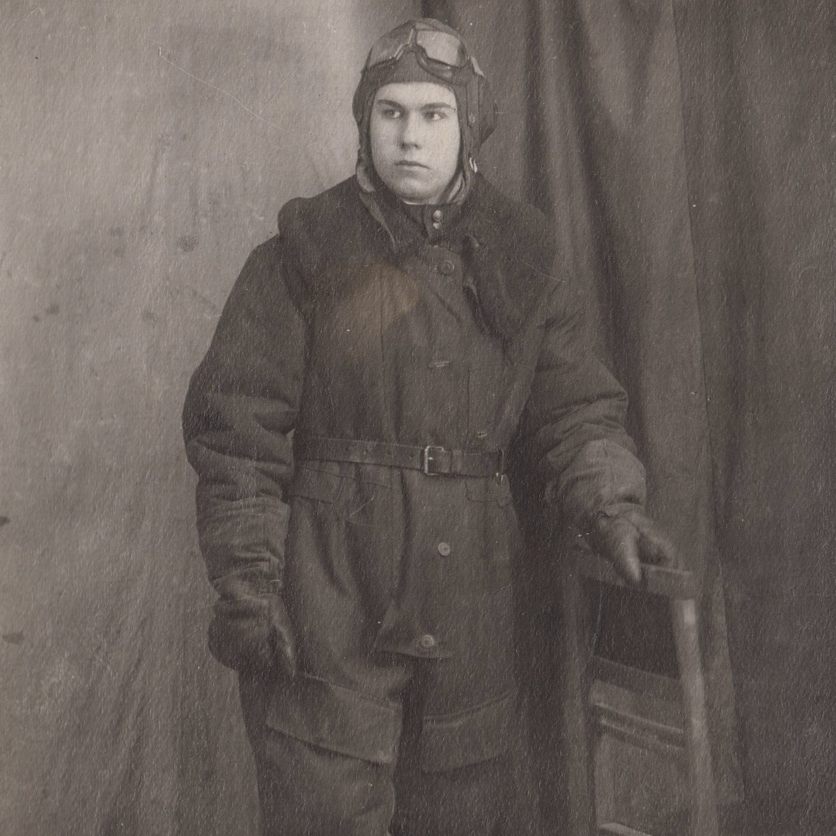 A large photo of a Red Army pilot in flight gear