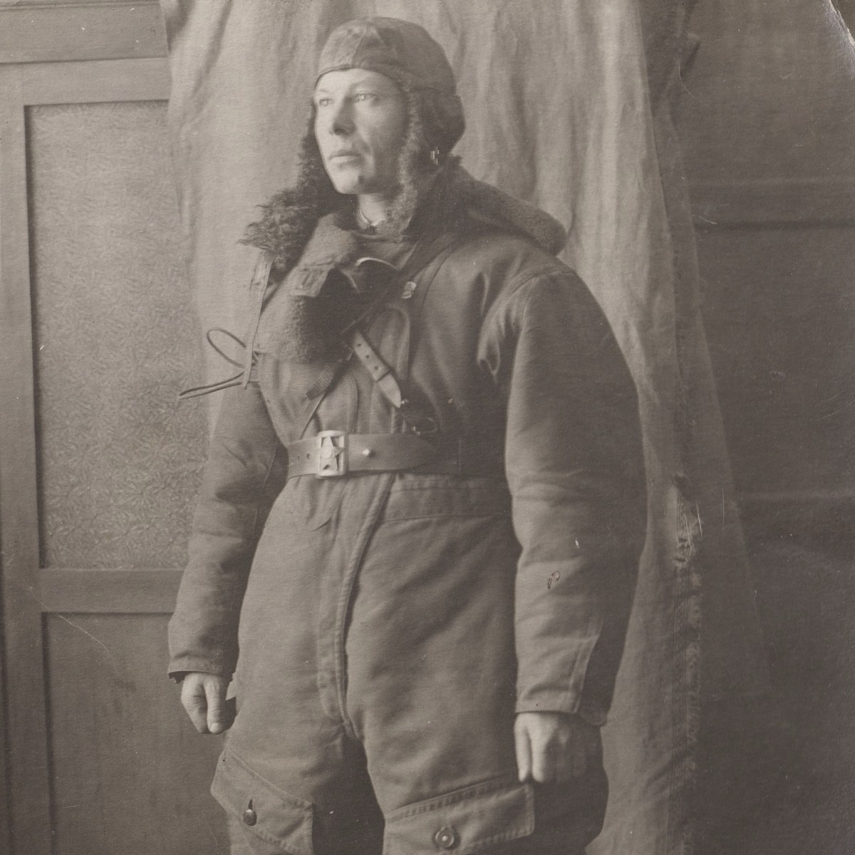 A large photo of a Red Army pilot in flight gear