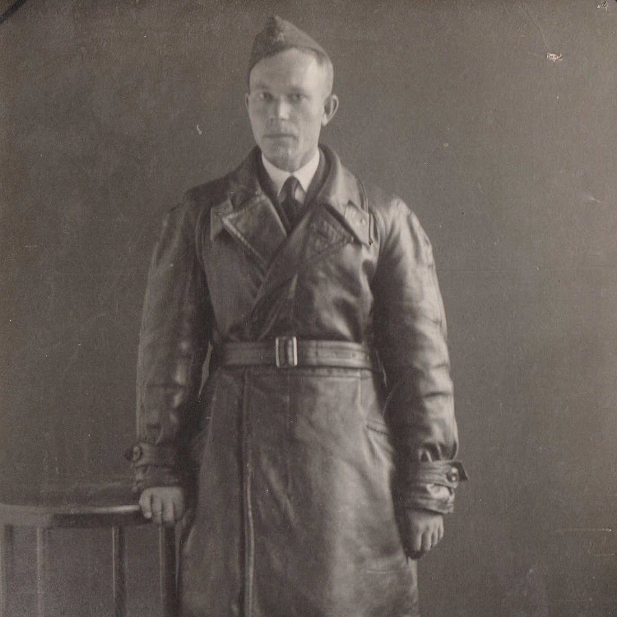 Photo of a lieutenant of the Red Army Air Force in a leather raincoat