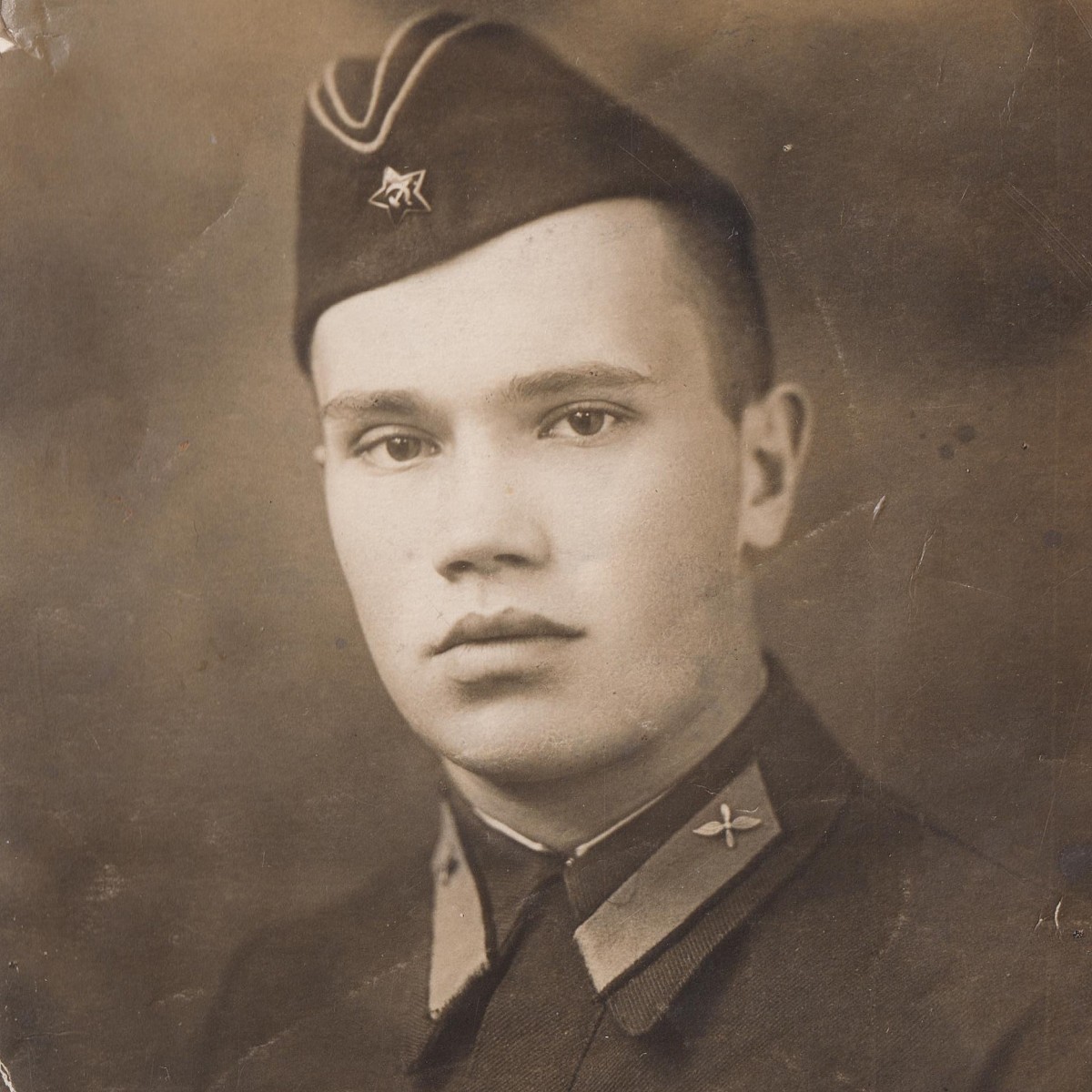 Photo of a cadet from one of the Red Army Air Force schools with a parachutist badge