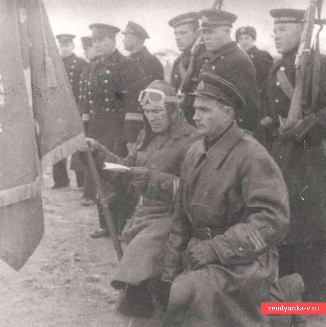 Photo of the first twice Hero of the Soviet Union B.F. Safonov at the banner