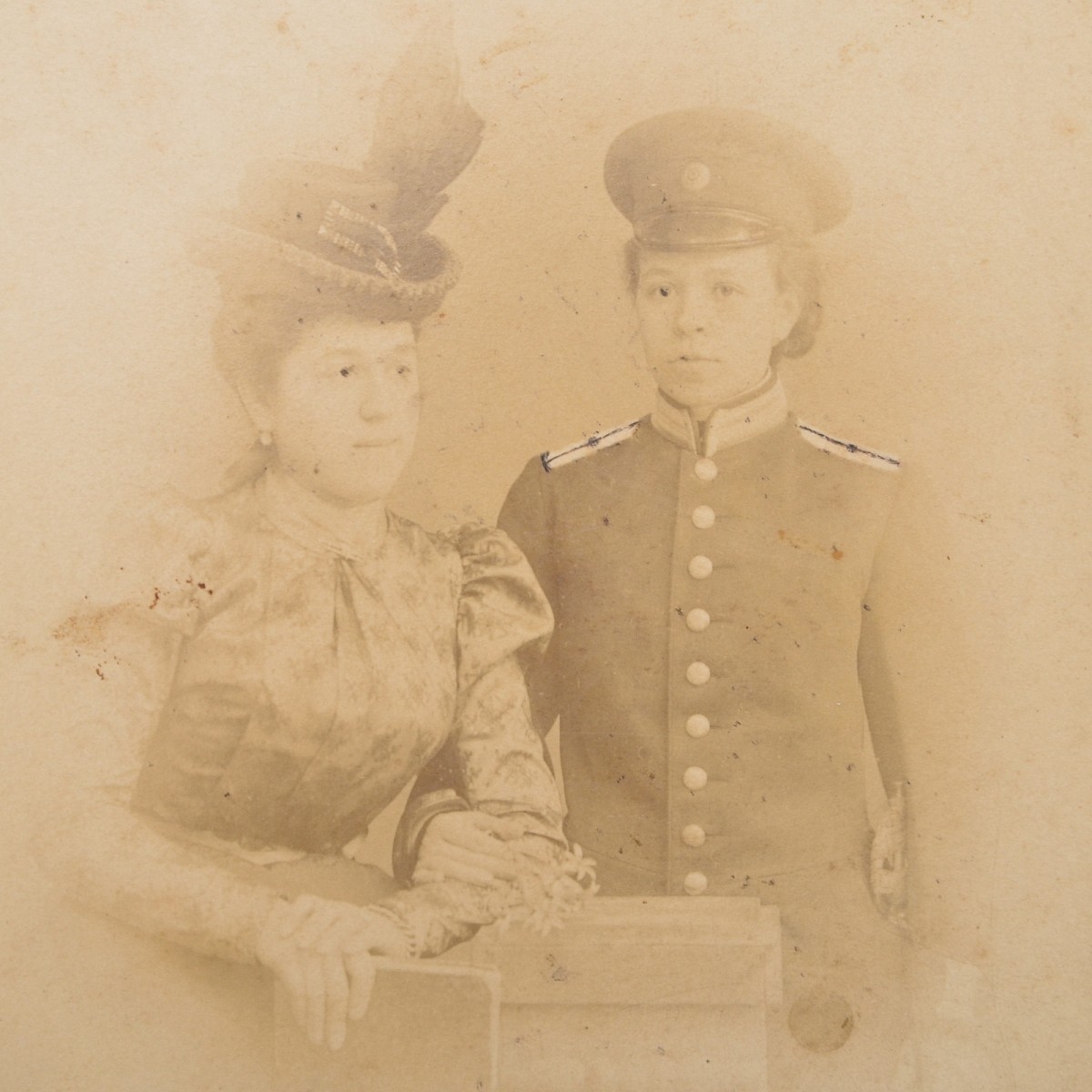 Photo of a girl in an official's uniform, with a sword