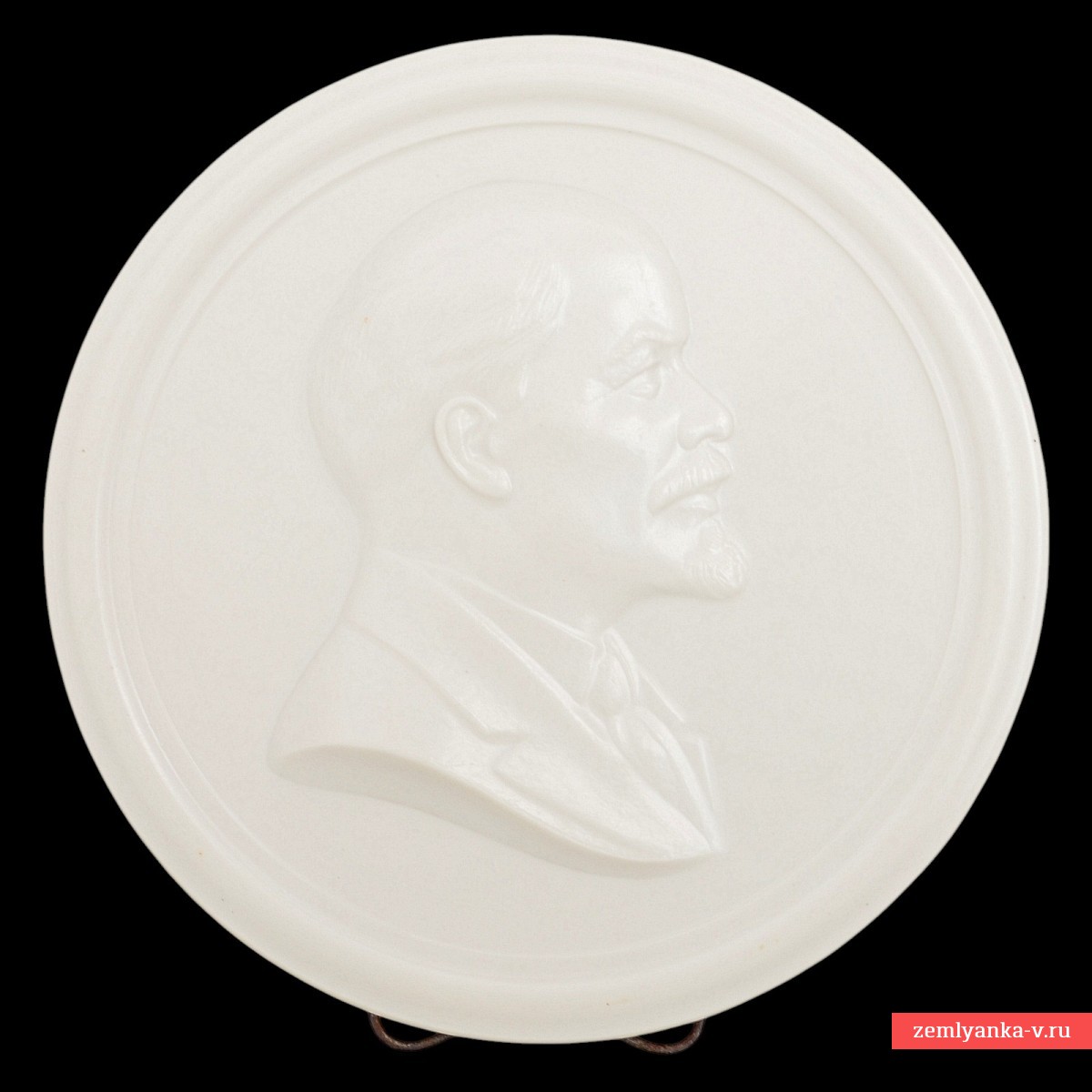 A tabletop poster with a profile picture of V.I. Lenin