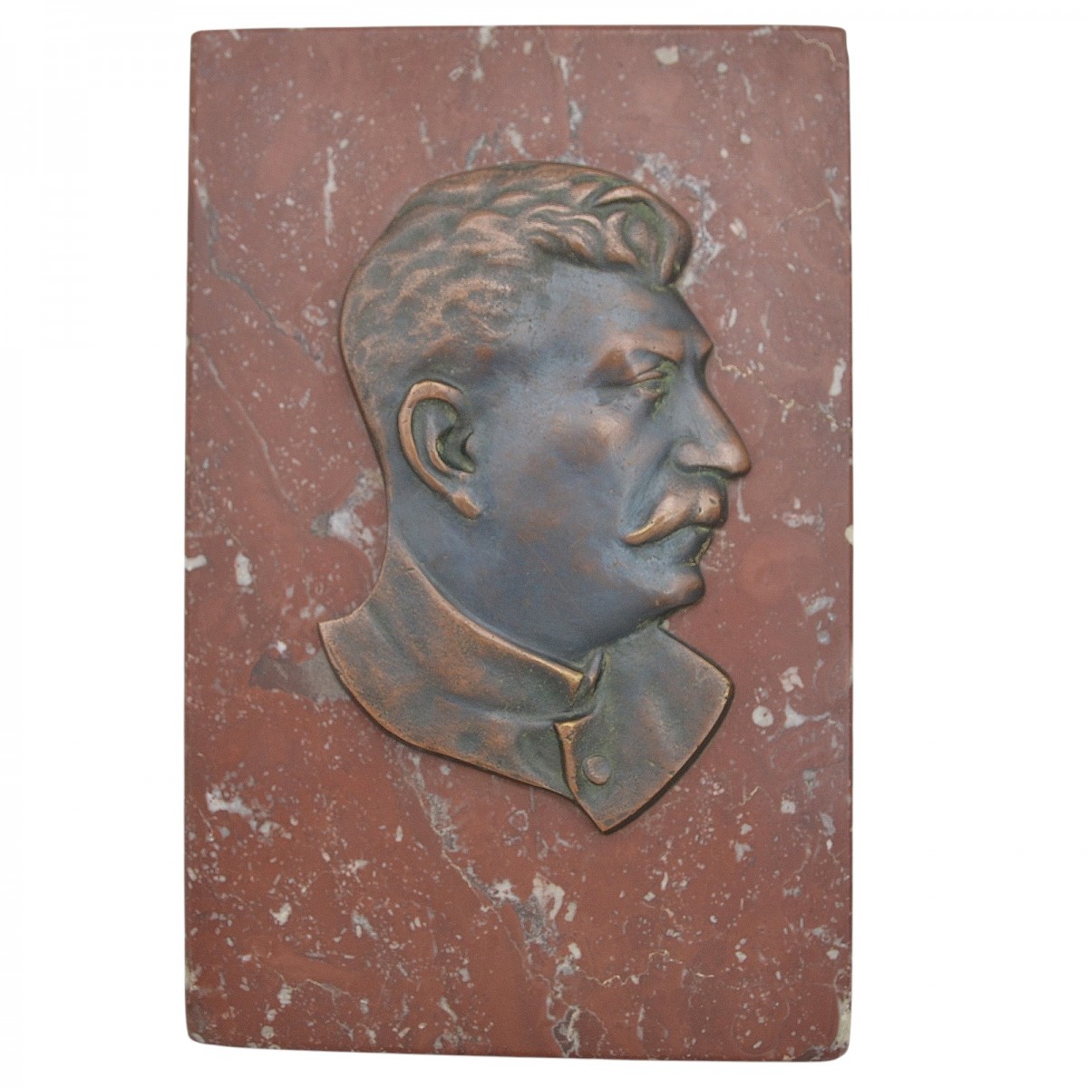 A tabletop poster depicting the profile of I.V. Stalin
