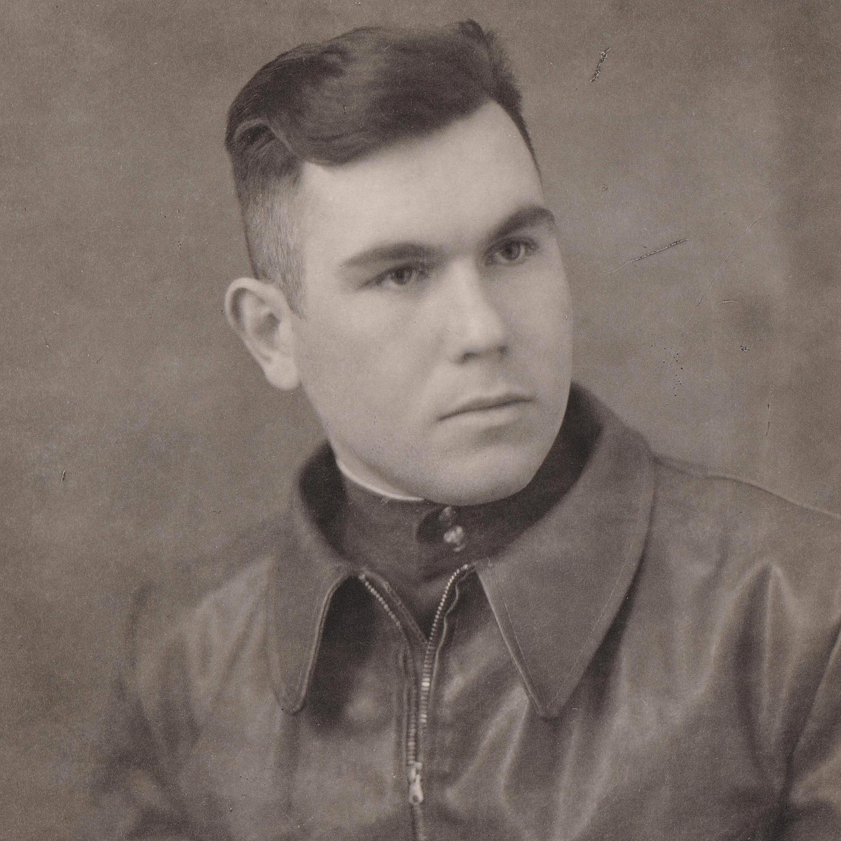 Photo of a military pilot (?) of the Red Army in a leather jacket